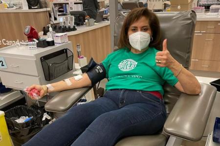 Hon. Salma Lakhani Lieutenant Governor of Alberta donating blood